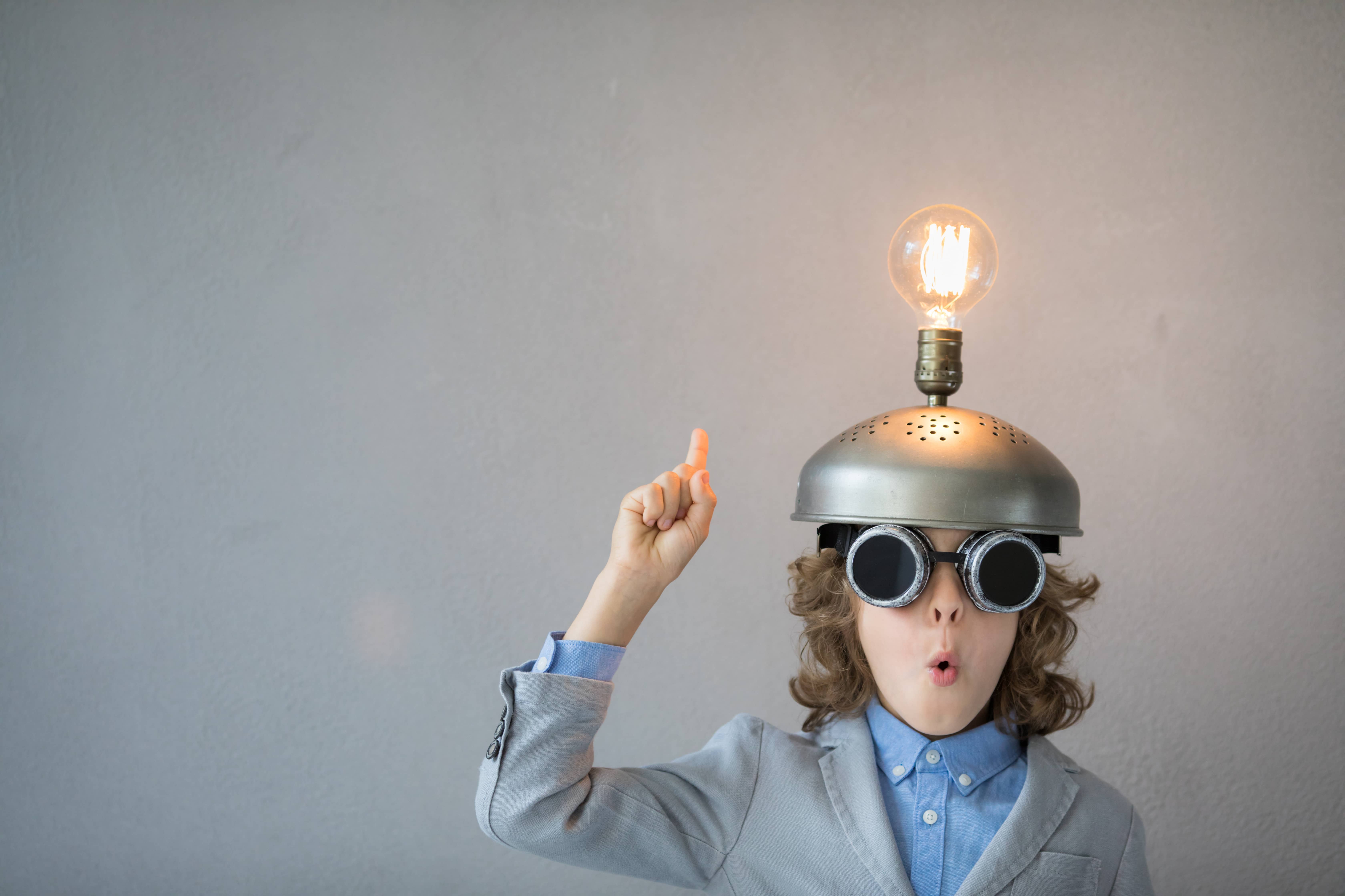 Children with a light on his head